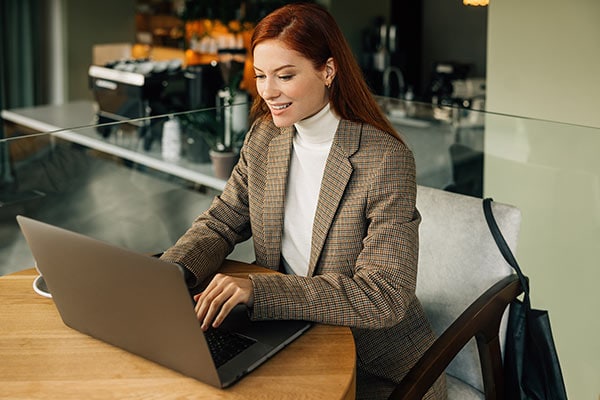 young businesswoman using laptop